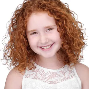 Young actor headshot of girl with bright red curly hair and freckles wearing white lace sleeveless top on white studio background by headshot photographer Richard Waine in Lancaster PA